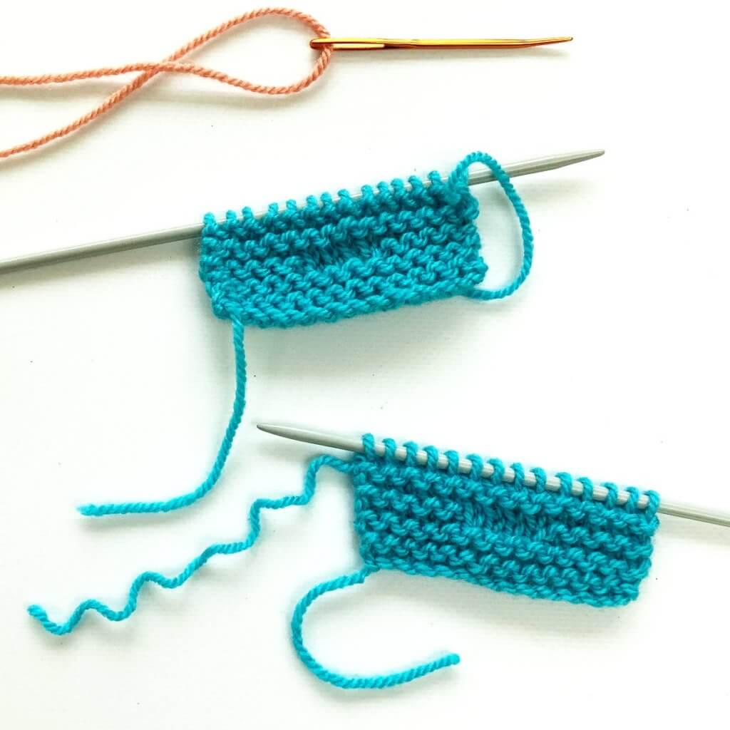 2 garter stitch swatches and a darning needle