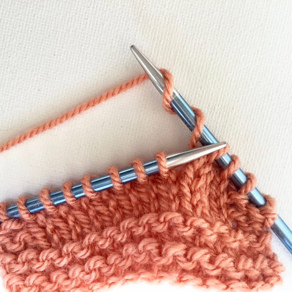 Wrapping the yarn around the needle twice