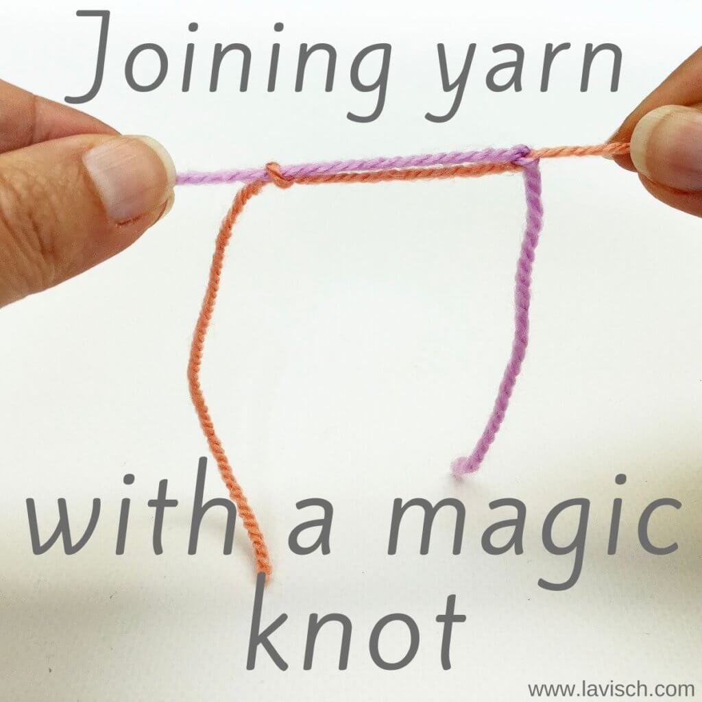 Joining yarn with a magic knot.