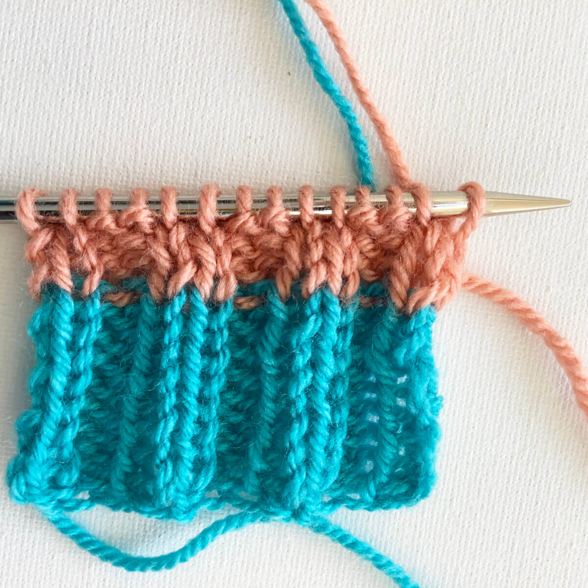 Knitting stripes in rib patterning