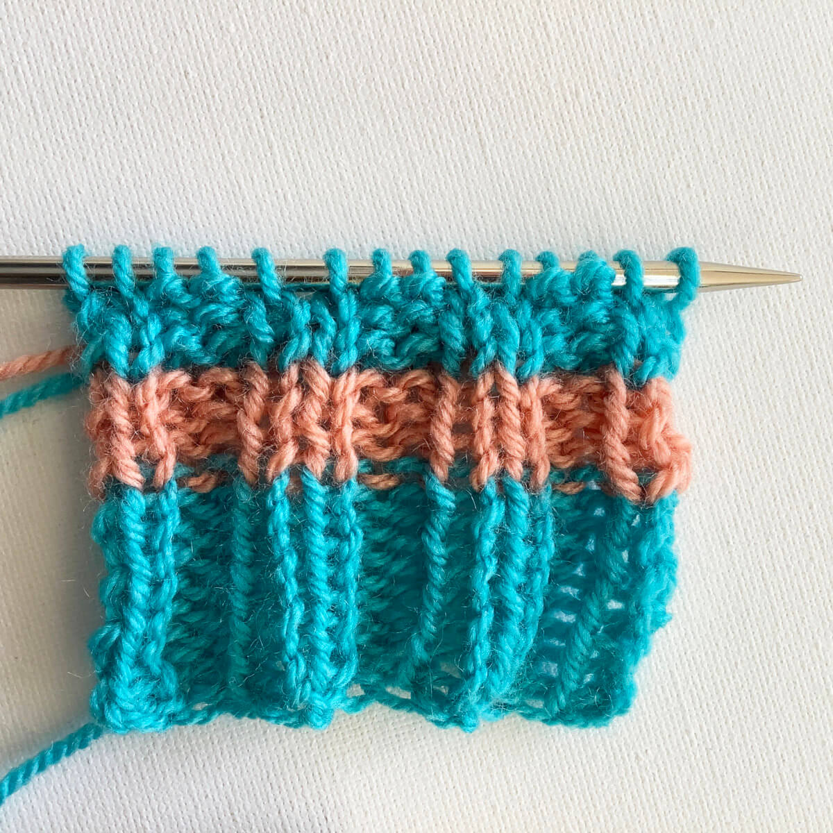 Knitting stripes in rib patterning