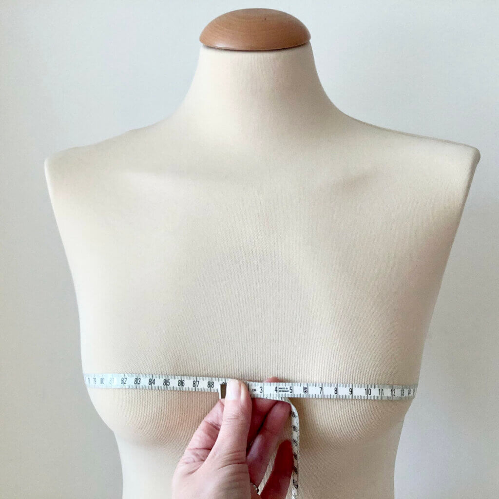 Measuring the full bust measurement to calculate the vertical bust dart