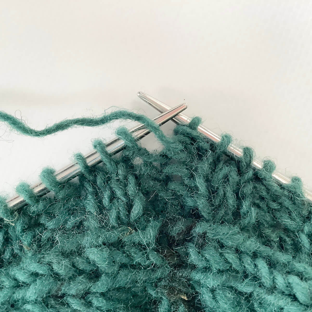 Step 6 of knitting a two-stitch buttonhole