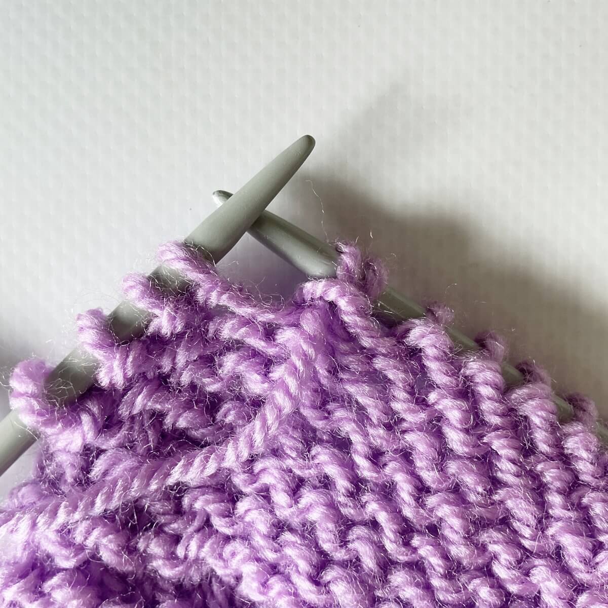 Working shadow wrap short rows on the WS - step 4