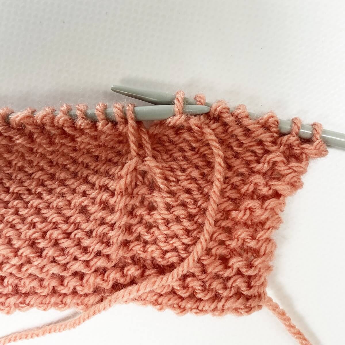 Tuck stitch with lifted purl bump - step 4