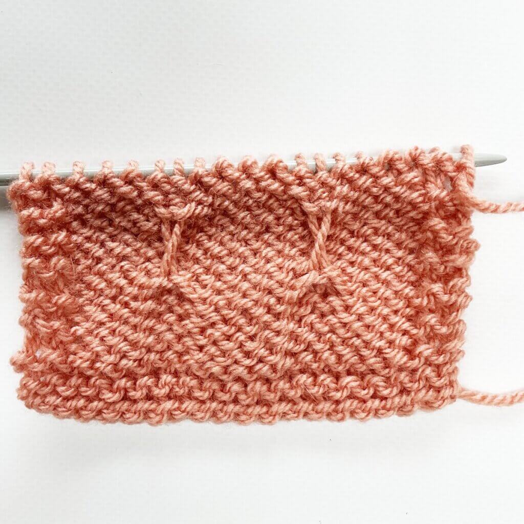 Tuck stitch with lifted purl bump - the result on the WS