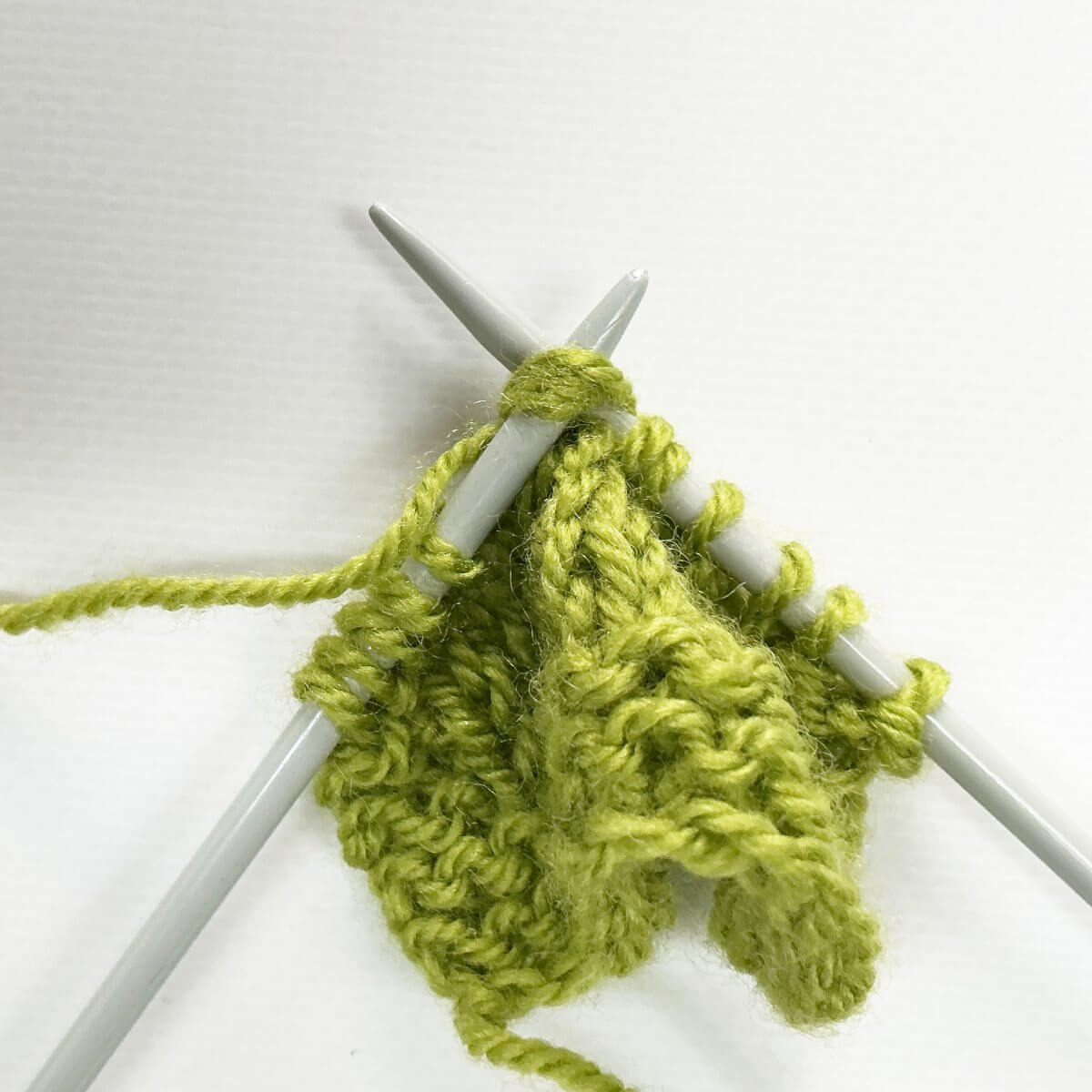 Step 5 of working the k4tog bf decrease