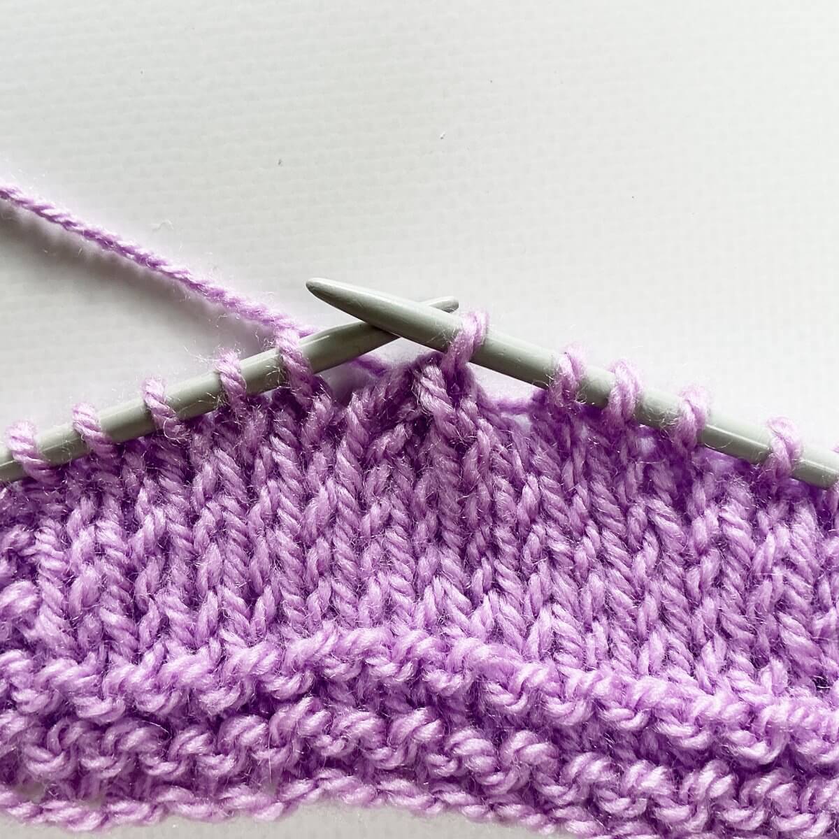 The result of working a sl2-k2tog-p2sso decrease