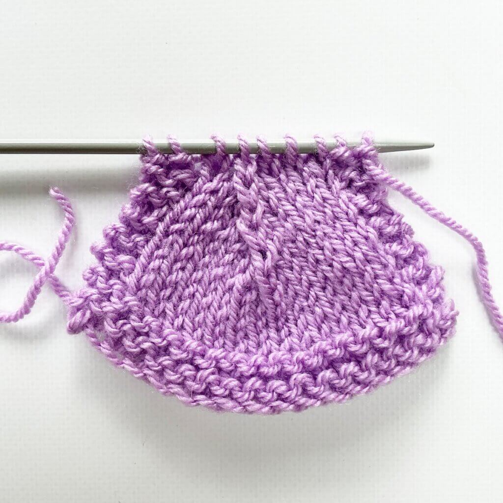 The sl2-k2tog-p2sso left-leaning centered decrease from the RS