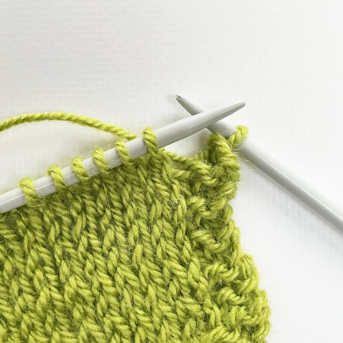 Step 3 of knitting the yarn over bind-off - version 1