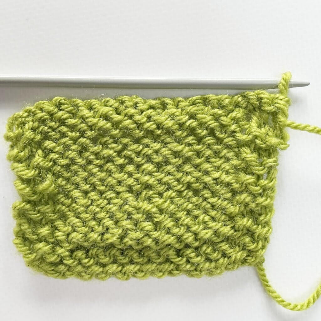 The result from the WS of knitting the yarn over bind-off - version 1