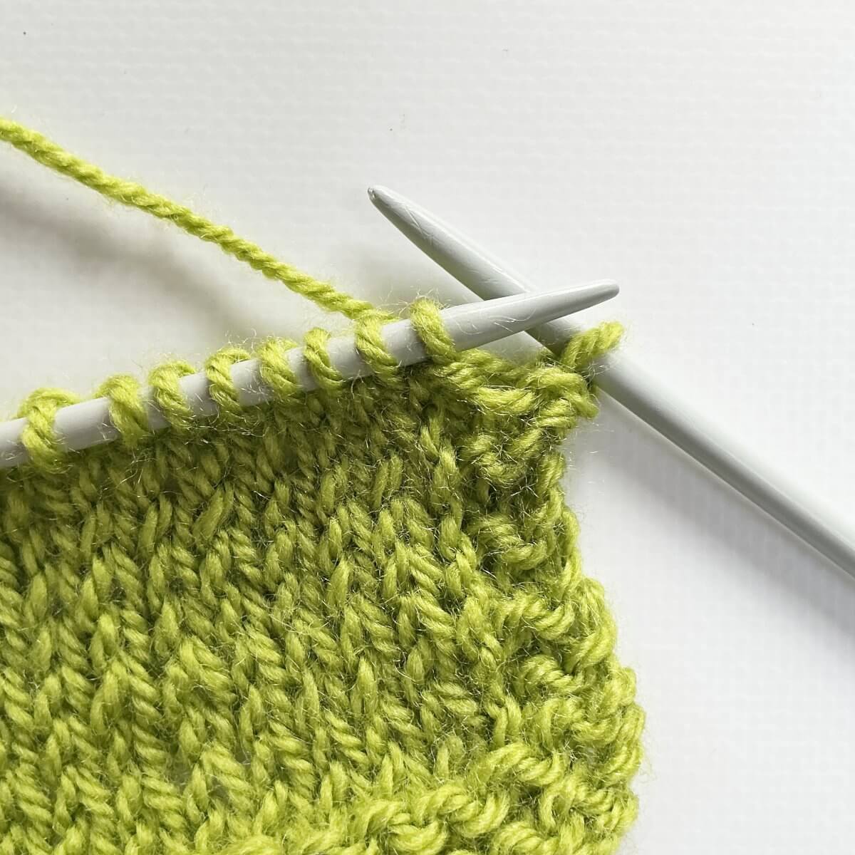 Step 1 of knitting the yarn over bind-off - version 2