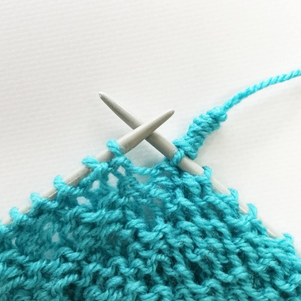 Step 9 of how to work the spring stitch