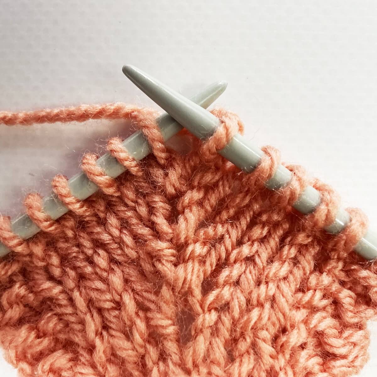 Step 1 of working the double knit below increase