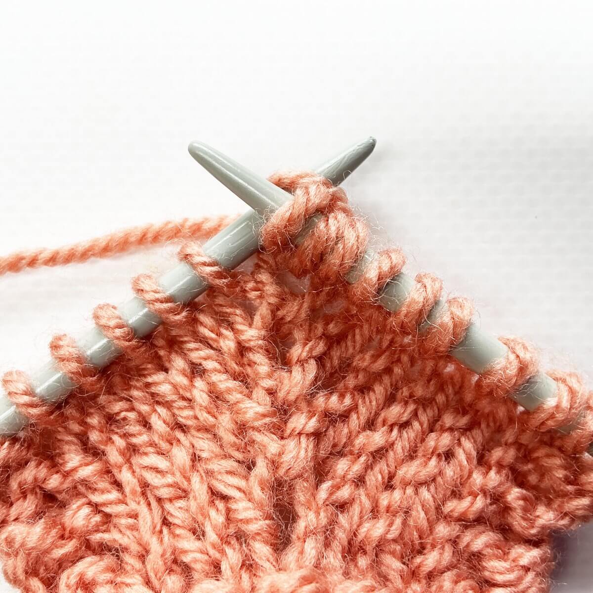 Step 5 of working the double knit below increase
