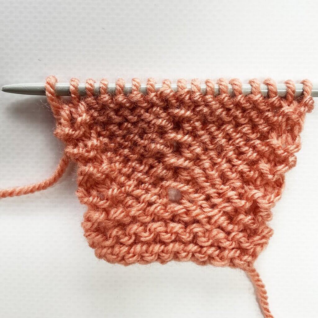 The result of working the double knit below increase, from the WS