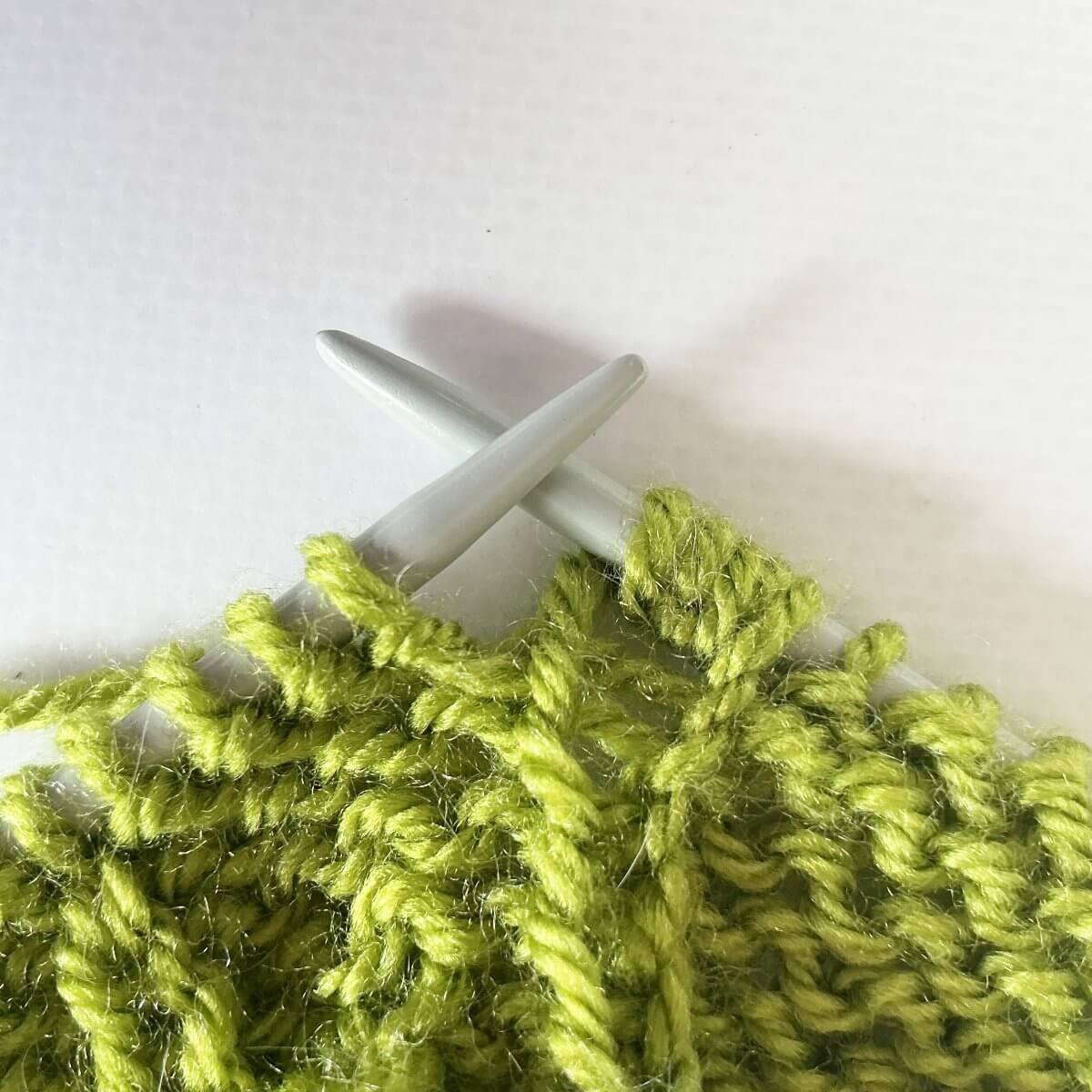 Step 1 of knitting backwards