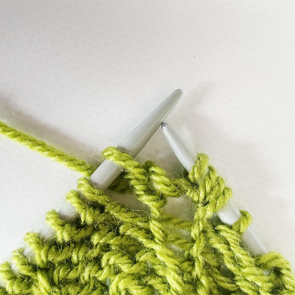Step 5 of knitting backwards