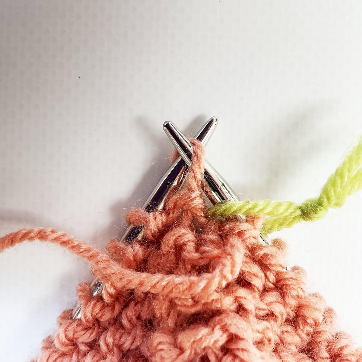 Step 3 of working jog-less garter stitch in the round with the sl1 wyif method